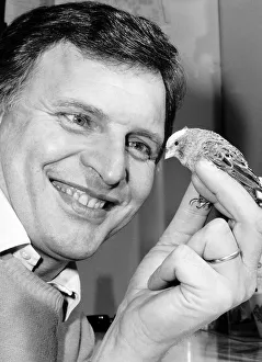 Peter Dean actor in the soap Eastenders with one of his twenty four Canaries Peter Dean actor in the soap Eastenders with one of his twenty four Canaries