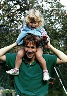 Peter Duncan TV Presenter with daughter on shoulders A©Mirrorpix Peter Duncan TV Presenter with daughter on shoulders A©Mirrorpix