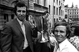 Peter Osgood and John Dempsie of Chelsea on open top bus with European cup winners cup Peter Osgood and John Dempsie of Chelsea on open top bus with European cup winners cup