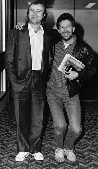 Phil Collins singer with Eric Clapton in 1987 Phil Collins singer with Eric Clapton in 1987