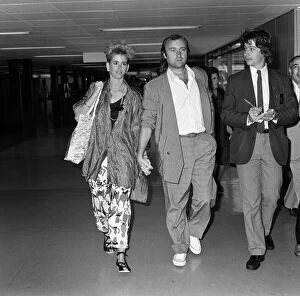 Images Dated 1st September 1985: Phil Collins and his wife Jill at LAP to catch a flight to Greece. 1st September 1985