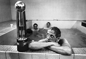 Phil Neal admires the Canon League trophy in the bath as Liverpool clinch another League Phil Neal admires the Canon League trophy in the bath as Liverpool clinch another League