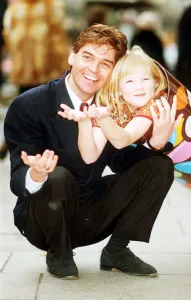 Phillip Schofield TV Presenter with Hannah Masu who collects her prize for a little Phillip Schofield TV Presenter with Hannah Masu who collects her prize for a little