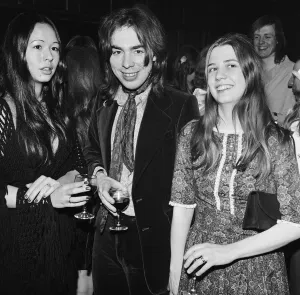 Photo shows from left to right Lady Unknown, Andrew Lloyd Webber Photo shows from left to right Lady Unknown, Andrew Lloyd Webber