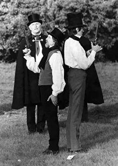 Pistols at dawn. Mr. John Barnard and Dr. Michael Carson faced each other in the crisp Pistols at dawn. Mr. John Barnard and Dr. Michael Carson faced each other in the crisp