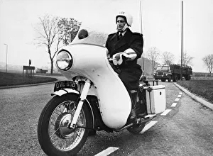 A police motorcycle patrol officer at work in Cambridgeshire. 25th November 1966 A police motorcycle patrol officer at work in Cambridgeshire. 25th November 1966