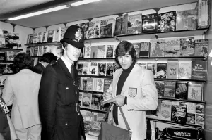 A policeman gets England footballer Malcolm MacDonald's autograph at Heathrow airport A policeman gets England footballer Malcolm MacDonald's autograph at Heathrow airport