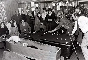 Pool players at the Smelters Arms in Castleside Co.Durham playing alongside a coffin in Pool players at the Smelters Arms in Castleside Co.Durham playing alongside a coffin in