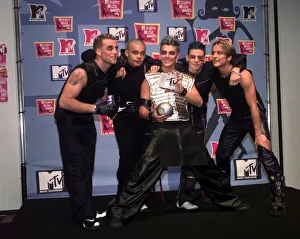 Pop group Fives holding their awards at the MTV Awards Ceremony in Milan November Pop group Fives holding their awards at the MTV Awards Ceremony in Milan November