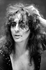 Pop singer Alice Cooper aged 23 flew into Heathrow Airport today with his pet boa Pop singer Alice Cooper aged 23 flew into Heathrow Airport today with his pet boa