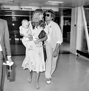 Pop singer Rod Stewart with wife Alana and 10 month old Kimberley leave Heathrow for New Pop singer Rod Stewart with wife Alana and 10 month old Kimberley leave Heathrow for New