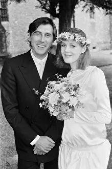 Pop star Bryan Ferry poses with his bride Lucy Helmore after thier wedding ceremony at St Pop star Bryan Ferry poses with his bride Lucy Helmore after thier wedding ceremony at St