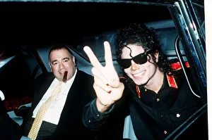 Pop star Michael Jackson gives the V sign as he arrives at Heathrow Airport for a concert Pop star Michael Jackson gives the V sign as he arrives at Heathrow Airport for a concert