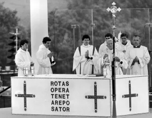 Pope John Paul II assisted by priests, leads the Mass at Heaton Park, Manchester Pope John Paul II assisted by priests, leads the Mass at Heaton Park, Manchester