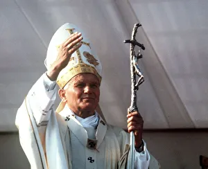 Pope John Paul II delivers his blessing while conducting an open air mass in Bellahouston Pope John Paul II delivers his blessing while conducting an open air mass in Bellahouston