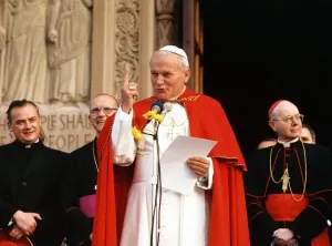 Pope John Paul II delivers a sermon to the crowd outside the cathedral in Glasgow Pope John Paul II delivers a sermon to the crowd outside the cathedral in Glasgow
