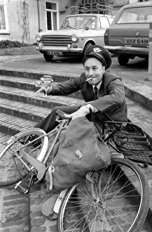Postman Trevor Bennett celebrating his good news with a glass of champagne Postman Trevor Bennett celebrating his good news with a glass of champagne