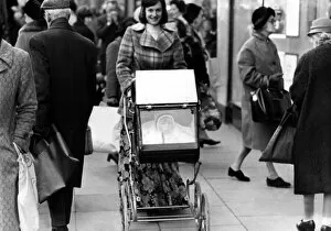 Images Dated 25th January 1973: As prams go, it is very rare indeed. For it has windows
