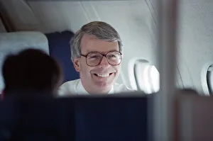 Prime Minister John Major pictured on an aeroplane. 17th March 1992 Prime Minister John Major pictured on an aeroplane. 17th March 1992