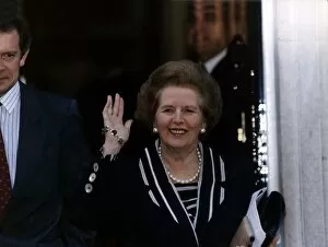 Images Dated 15th November 1990: Prime Minister Margaret Thatcher waving as she walks out of the house November 1990