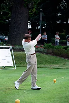 Prince Andrew July 98 Hitting golf ball on golf tee at a golf tournament Prince Andrew July 98 Hitting golf ball on golf tee at a golf tournament