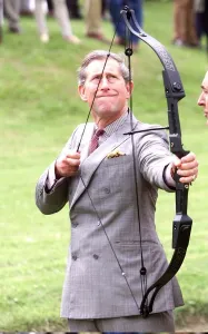 Prince Charles with bow and arrow at archery practice at clay pigeon shoot to raise money Prince Charles with bow and arrow at archery practice at clay pigeon shoot to raise money