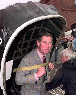Prince Charles carries a coracle July 1998 during his visit to the Swansea Maritime Prince Charles carries a coracle July 1998 during his visit to the Swansea Maritime