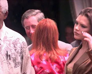 Prince Charles gets a kiss from Geri Halliwell outside President Nelson Mandelas house in Prince Charles gets a kiss from Geri Halliwell outside President Nelson Mandelas house in
