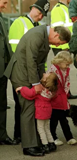 Prince Charles gets an unexpected hug from four year old Sarah Norris during a school Prince Charles gets an unexpected hug from four year old Sarah Norris during a school