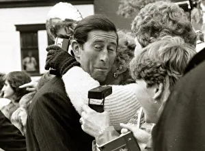 Prince Charles mobbed by female fans in Atherstone, Warwickshire Embrace embracing Prince Charles mobbed by female fans in Atherstone, Warwickshire Embrace embracing