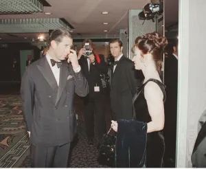Prince Charles talked to Robyn Gibson, whilst her actor husband Mel Gibson looks Prince Charles talked to Robyn Gibson, whilst her actor husband Mel Gibson looks