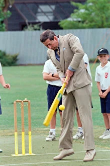 Images Dated 10th February 1994: Prince Charles tries his hand at cricket during a visit to Fendalton Primary School