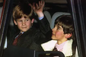 Prince Harry waves at press as he arrives Zurich airport with friend George Gruber Prince Harry waves at press as he arrives Zurich airport with friend George Gruber