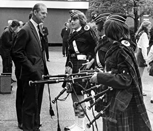 Prince Philip, Duke of Edinburgh, North West visits. The Duke chats to three pipers of Prince Philip, Duke of Edinburgh, North West visits. The Duke chats to three pipers of