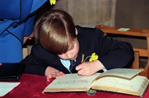 Prince William signing a Visitors Book in Wales on St. David's Day Prince William signing a Visitors Book in Wales on St. David's Day