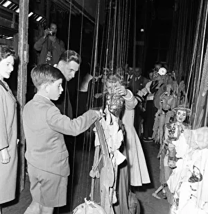 Princess Anne and Prince Charles worked the puppets backstage when they visited Princess Anne and Prince Charles worked the puppets backstage when they visited