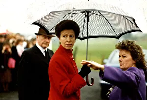 Princess Anne visit to Denny umbrella red coat Princess Anne visit to Denny umbrella red coat