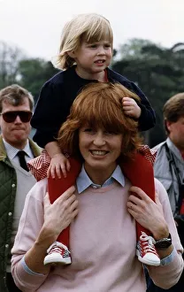 Princess Beatrice being carried by her mother the Duchess of York Princess Beatrice being carried by her mother the Duchess of York
