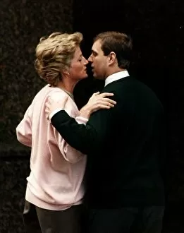 Images Dated 27th March 1990: Princess Diana kissing Prince Andrew March 1990