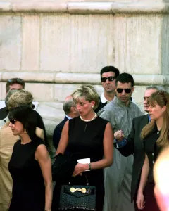 Princess Diana leaves a memorial service for slain Italian fashion designer Gianni Princess Diana leaves a memorial service for slain Italian fashion designer Gianni