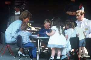 Princess Diana pictured with nursery school children during a visit to the Barnardo' Princess Diana pictured with nursery school children during a visit to the Barnardo'