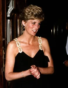 Princess Diana wearing a black low cut dress as she arrives at the London Coliseum Princess Diana wearing a black low cut dress as she arrives at the London Coliseum
