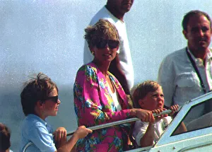 Princess Diana with their two young sons Prince Harry and Prince William on board an Princess Diana with their two young sons Prince Harry and Prince William on board an