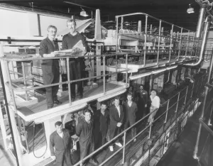 Printers of the Herald Express in 1991 with the press which used to roll up to seven Printers of the Herald Express in 1991 with the press which used to roll up to seven