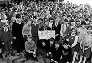 Images Dated 1st February 1985: Pupils from Billingham Church of England Junior school hand over a cheque for 1500