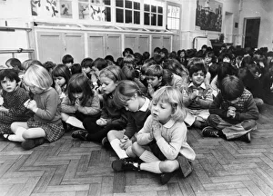 Pupils deep in concentration or just wishing for home time - Prayers during morning Pupils deep in concentration or just wishing for home time - Prayers during morning