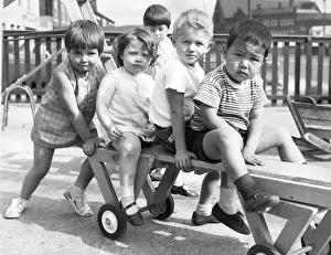 These pupils are enjoying the sunshine in their nursery playground These pupils are enjoying the sunshine in their nursery playground