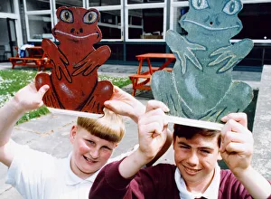 Pupils at Eston Park School with two of the frogs which are too be used in a frog race to Pupils at Eston Park School with two of the frogs which are too be used in a frog race to
