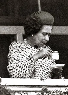 Queen Elizabeth II Derby Day 1982 Looking at tea leaves for inspiration Queen Elizabeth II Derby Day 1982 Looking at tea leaves for inspiration