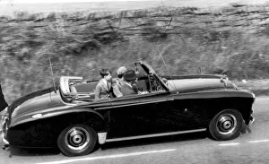 Queen Elizabeth II and The Duke of Edinburgh with Prince Charles driving in their car Queen Elizabeth II and The Duke of Edinburgh with Prince Charles driving in their car